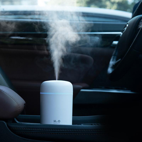 Umidificatore d'aria portatile con diffusore di aromi e oli essenziali per auto e casa.